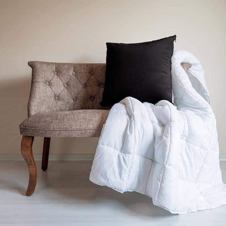 Black "Cushion Quilt" Pillow + Comforter 2-in-1 for wholesale by Cushion Quilts