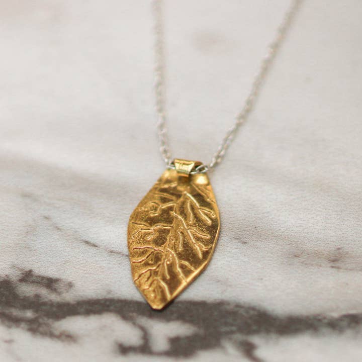 Brass leaf pendant necklace for wholesale by Louella Jewellery