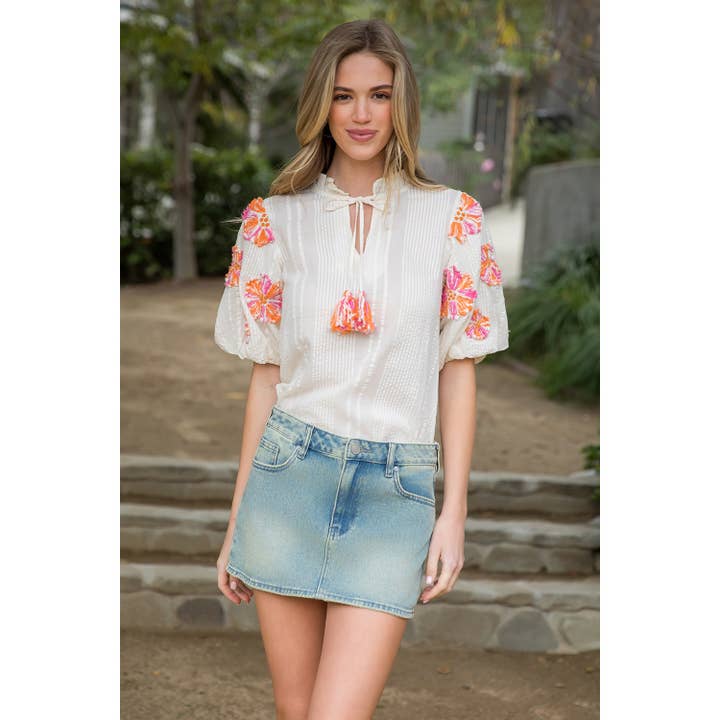 CREAM Hand Embroidered Puff Sleeve Tassel Top for wholesale on Faire
