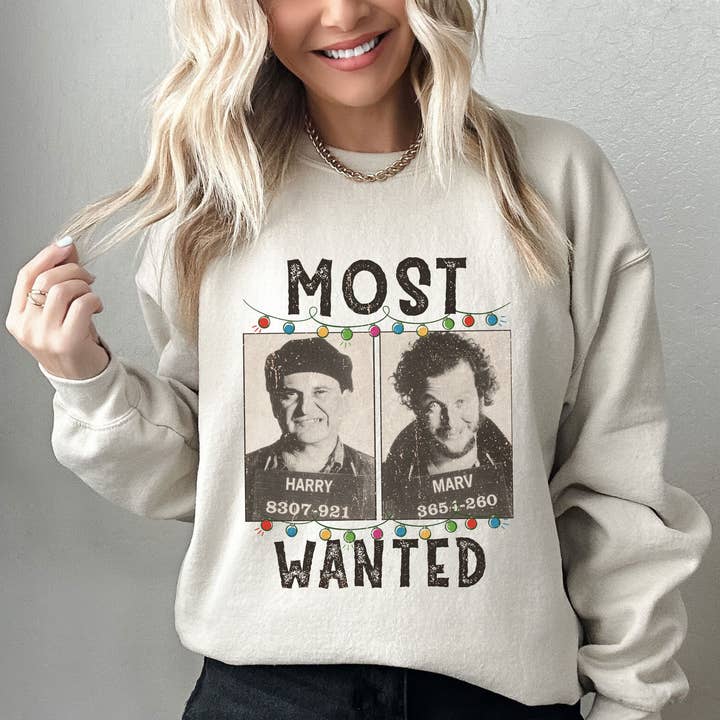 Retro Christmas Harry & Marv Most Wanted Mugshots Sweatshirt and other Purchase Wholesale most wanted. Free Returns & Net 60 Terms on Faire trending on Faire.