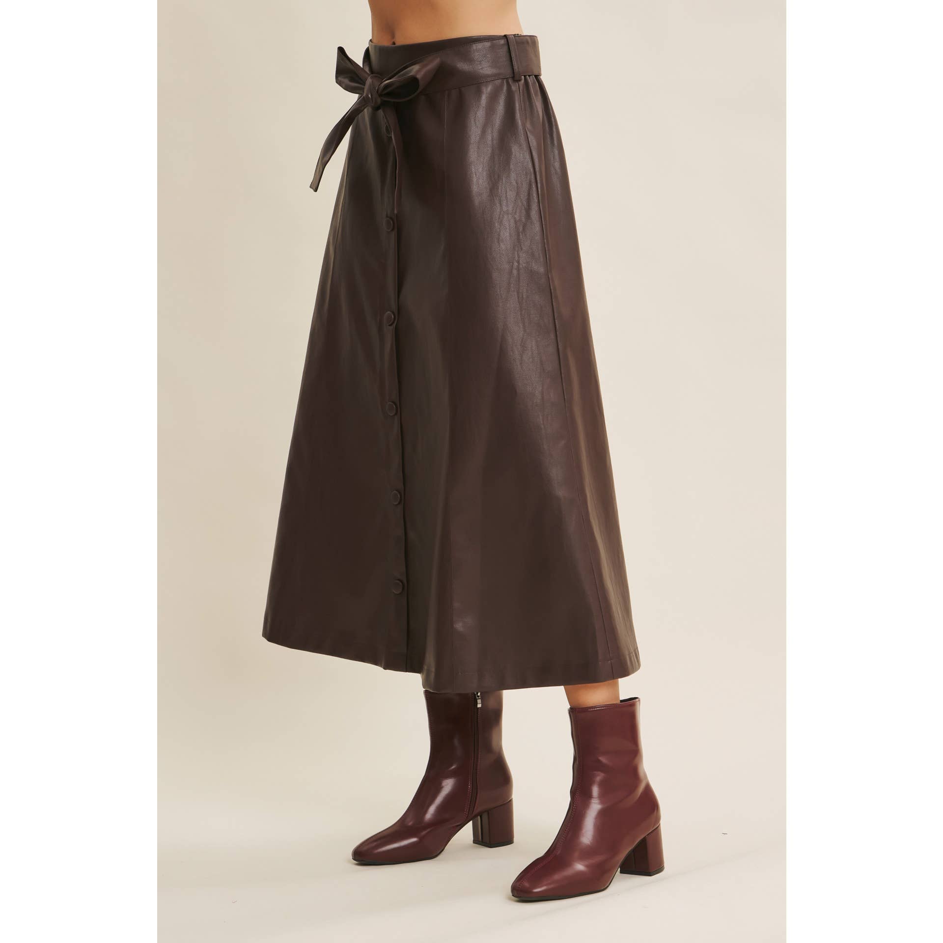 in february - Wholesale Skirt - Women's - SOPHISTICATED VEGAN FAUX LEATHER BELTED MIDI SKIRT1