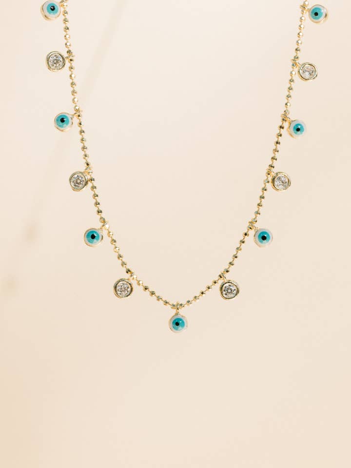 Collier pendentif en argent sterling en forme de mauvais œil et zircones cubiques pour la vente par Humble + Spark