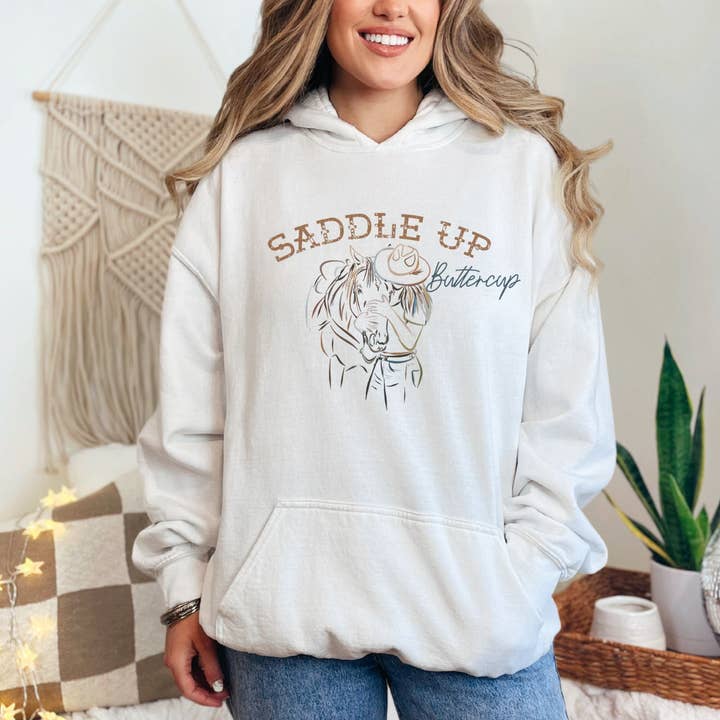 Saddle Up Buttercup Hoodie for wholesale by Mane and Feather Western Designs and Boutique