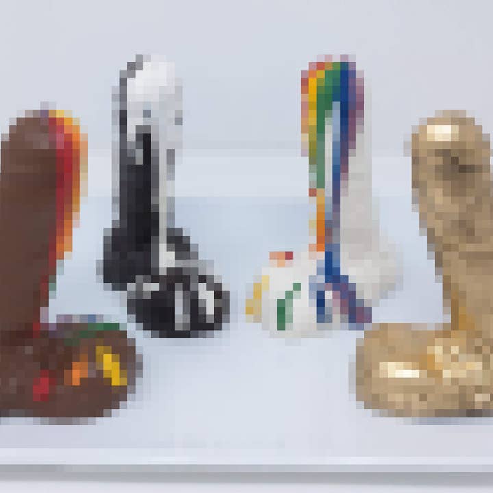 Wild Angel Treats, LLC - Wholesale Chocolate - Penis Solid Chocolate-optional Gold Dust or Pride Rainbow