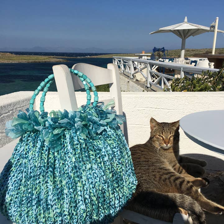 Raffia Turquoise Handwoven Tote, "Poseidon" and other Purchase Wholesale poseidon wc sitz. Free Returns & Net 60 Terms on Faire trending on Faire.