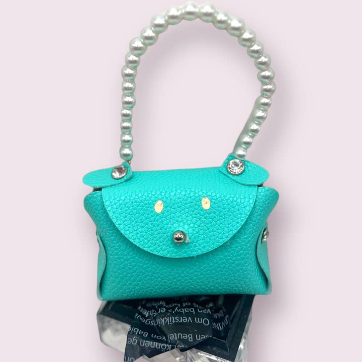 Sniffany Puppy Pick-Up Bag Carrier for wholesale by Bark Fifth Avenue