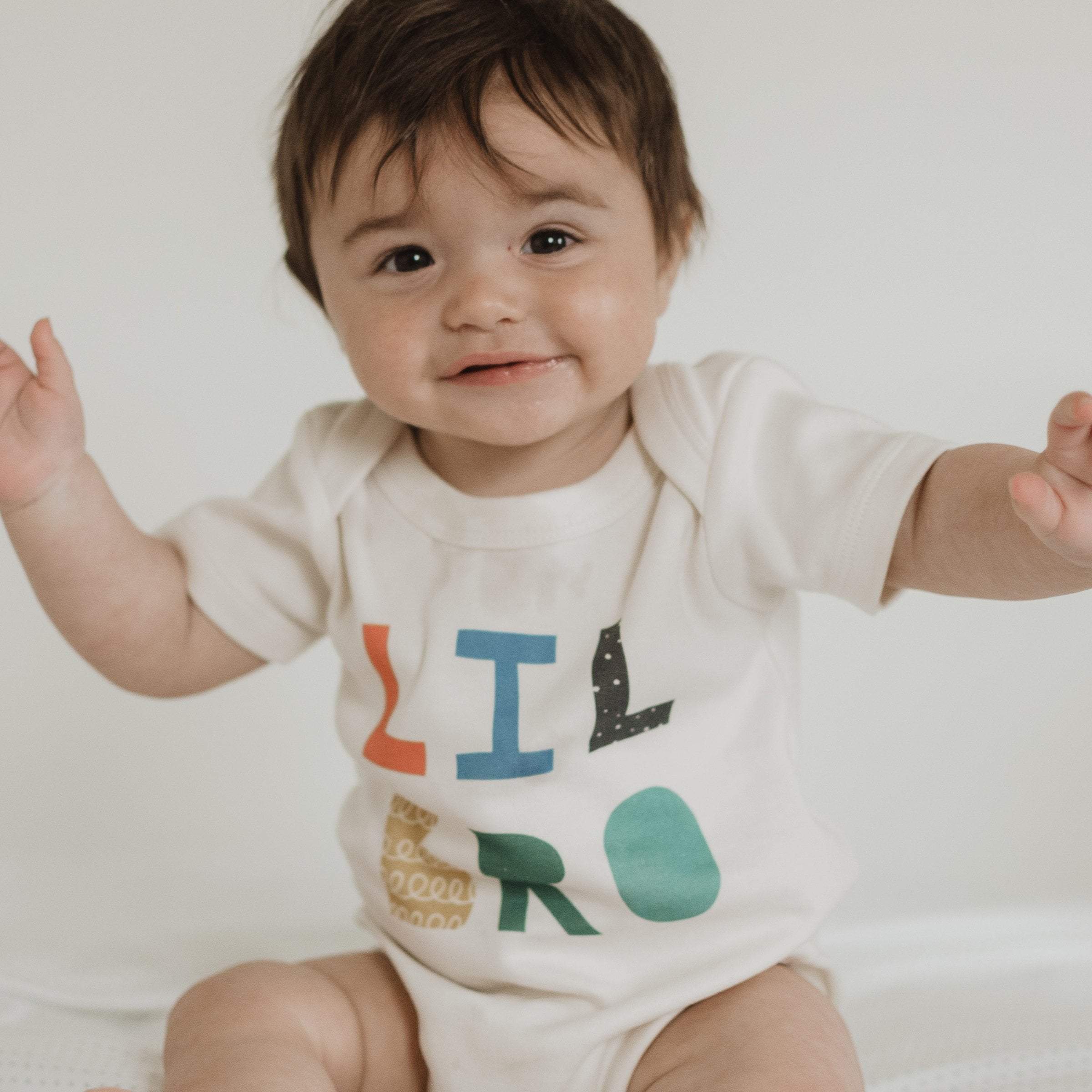 Default baby graphic organic bodysuit | lil bro original  for wholesale on Faire2