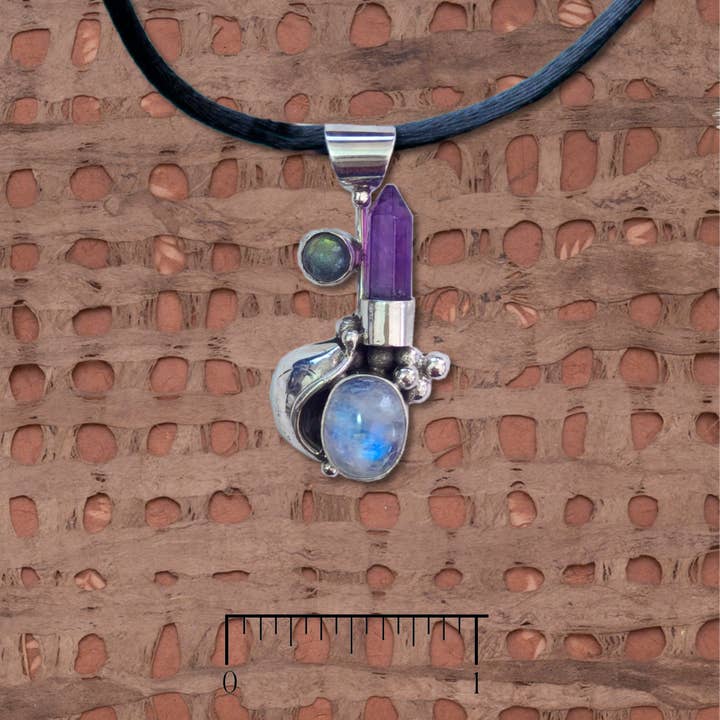 L-1296 Rainbow moonstone and black moonstone pendant for wholesale by Tidepool