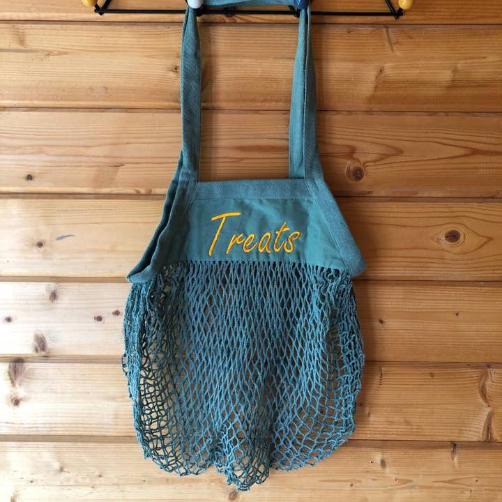 Treats string tote bag for wholesale by Embroidered Treasures