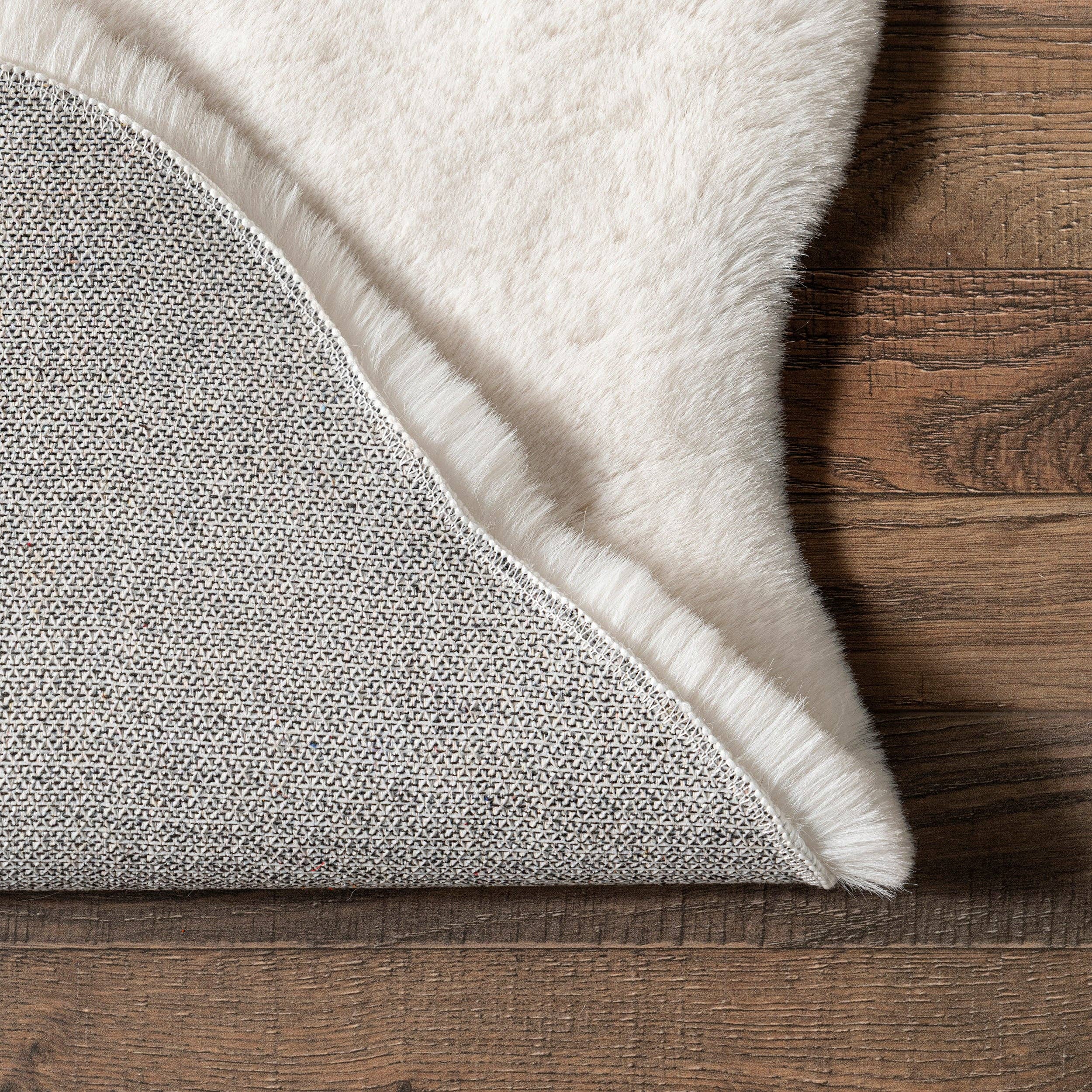 White Eline Faux Sheepskin Machine Washable Area Rug for wholesale on Faire6