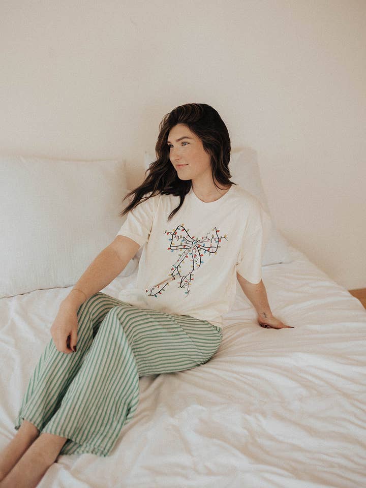 T-shirt nœud de Noël pour la vente par Casual Mode