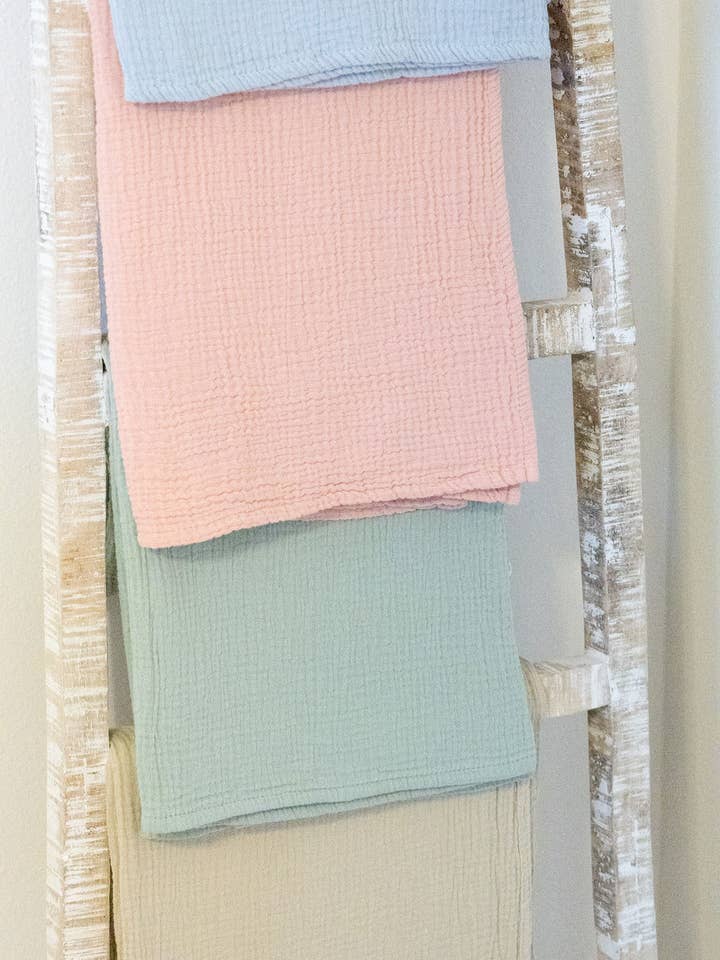 Organic Cotton Gauze Muslin Swaddle Blanket for wholesale by Cradle Comforts Co.