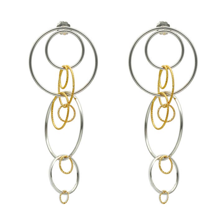 Oorbellen met cirkels van gerhodineerd zilver en goud @91 voor wholesale door ORUS BIJOUX