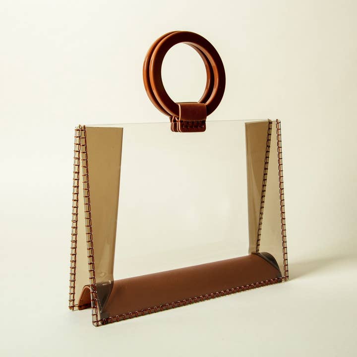 7043 - Clear Clutch Bag with Camel Handle and other Purchase Wholesale camel. Free Returns & Net 60 Terms on Faire trending on Faire.