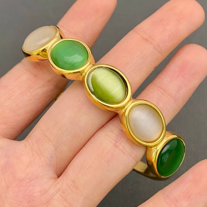 Bracelet en acier inoxydable plaqué or 18K avec œil de chat - FGS pour la vente par Mio Queena