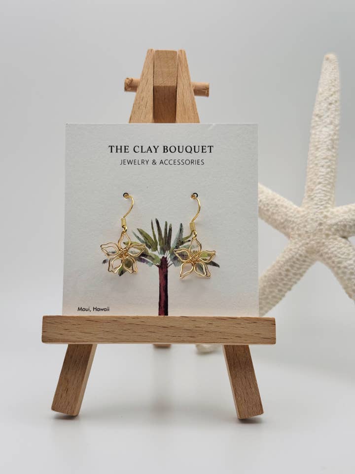 Gold wire flower earrings for wholesale by The Clay Bouquet