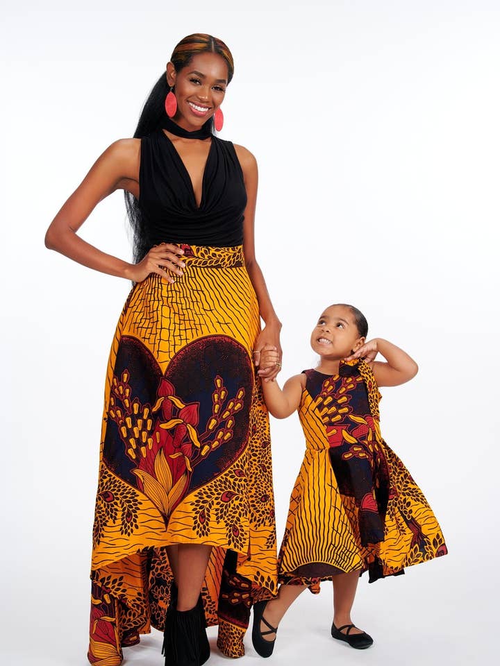 Josi høj-lav afrikansk print børnekjole for engroshandel hos Ray Darten