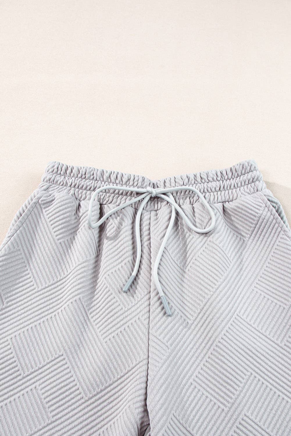 Lovesoft – Großhandel Loungewear-Set – Damen – Set aus festem, strukturiertem Top mit V-Ausschnitt und Hose mit weitem Beinausschnitt6