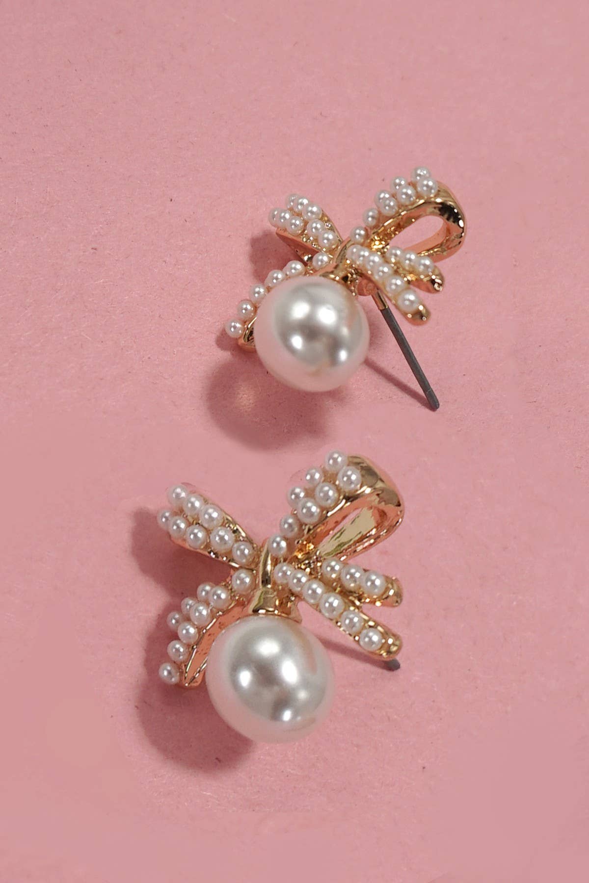 GOLD PEARL BOW STUD EARRINGS | 31E40103 for wholesale on Faire1