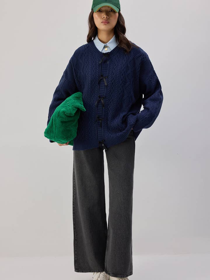 CARDIGAN IN MAGLIA CON DETTAGLI A FIOCCO per la vendita all'ingrosso da parte di Touché Privé