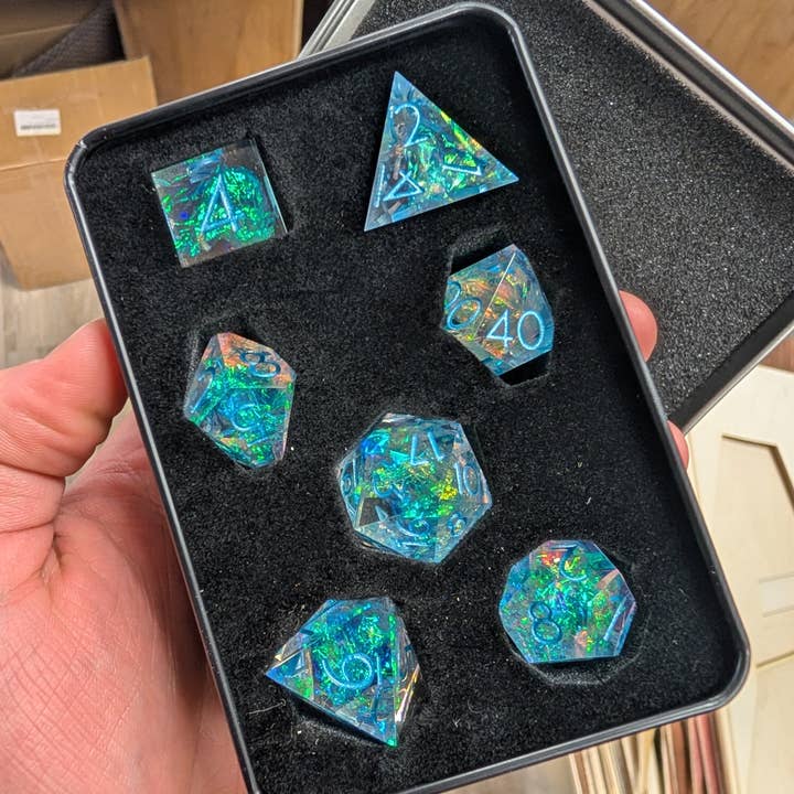 Frozen Halo 7-Piece Polyhedral Dice Set for wholesale by EBONWOOD