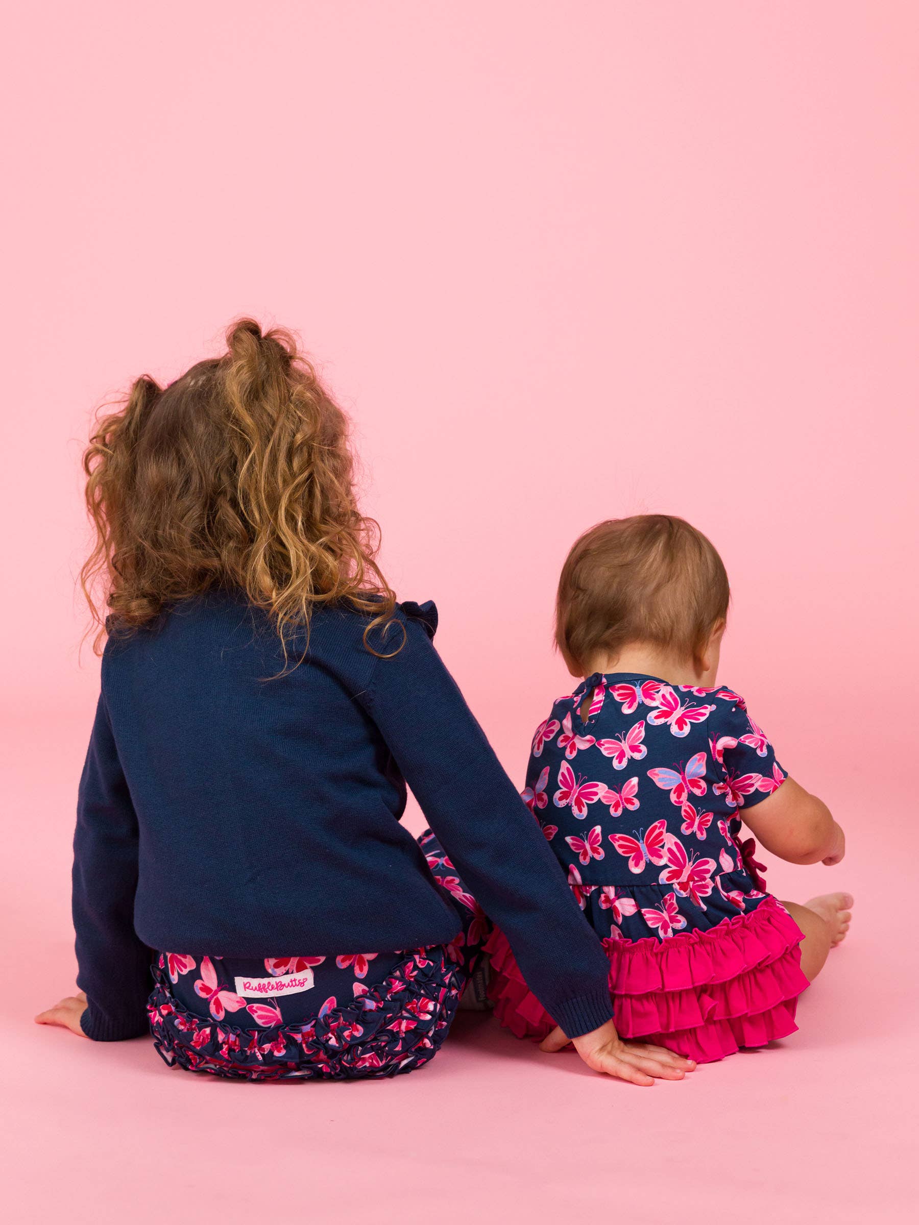 Navy Baby Girls Butterfly Bliss Knit Short Sleeve Bow Bubble Romper for wholesale on Faire4