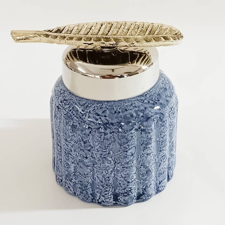 Fluted Recycled Glass Jar with Iron Lid Embossed Leaf Design for wholesale by Indriya Home