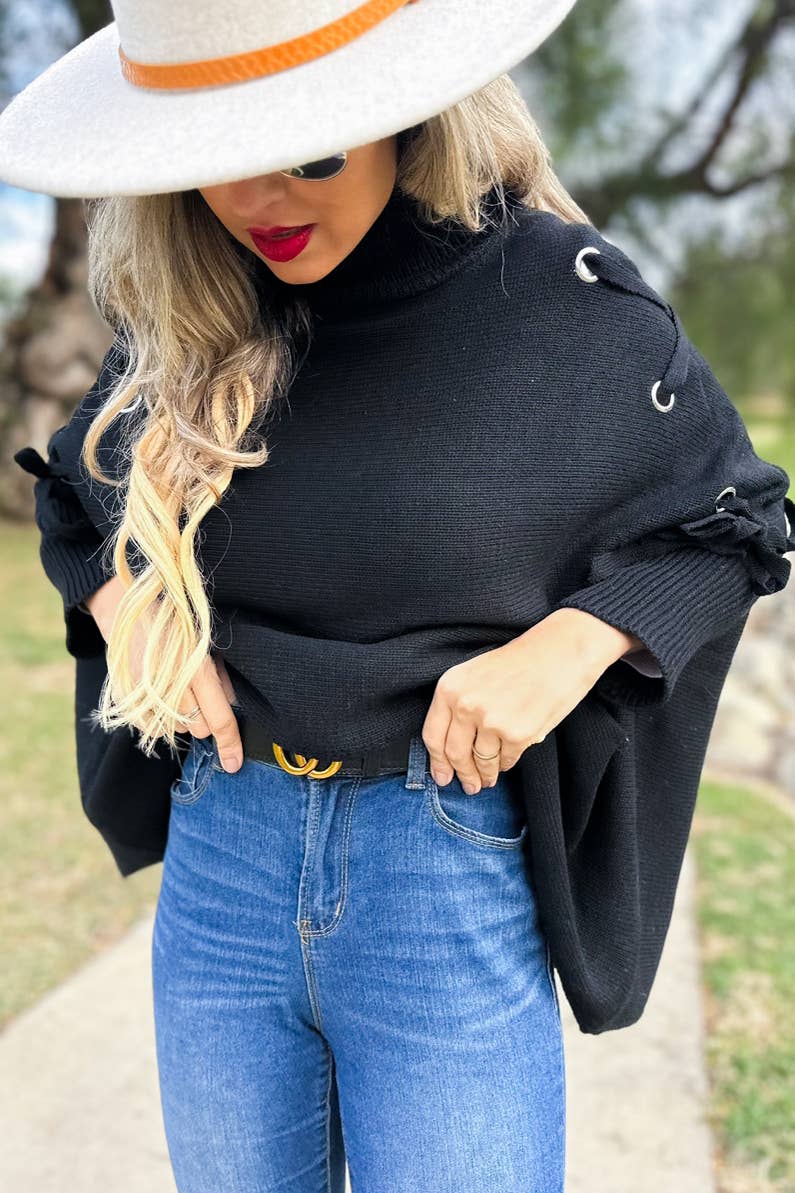 Noir Poncho tricoté noir avec col roulé et manches lacées en vente sur Faire6