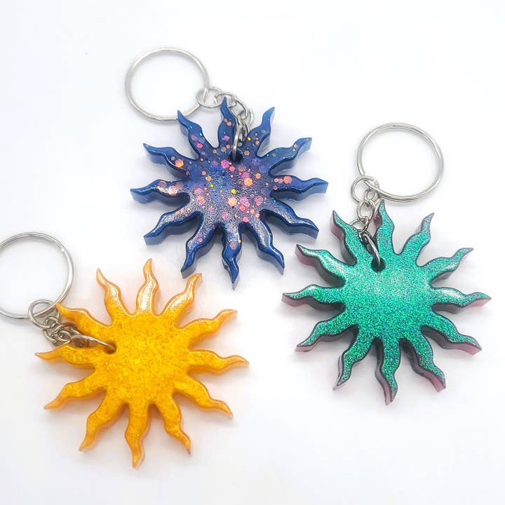 Eco-Friendly Resin Tribal Sun Key Chain for wholesale by Slightly Askew Art