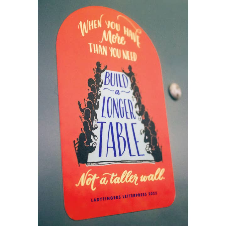 Ladyfingers Letterpress - Wholesale Sticker - Build a Longer Table, Not a Higher Wall Sticker