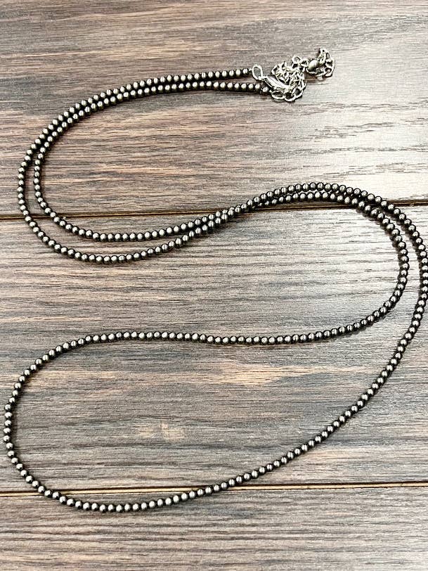 739550, Collar artesanal de cuentas navajo polacas de 46" y 4 mm para venta al por mayor de ISAC Trading Inc