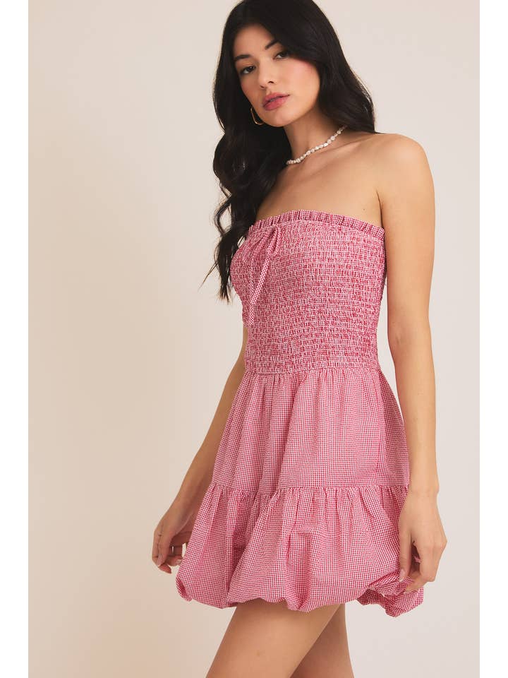 RED WHITE GINGHAM STRAPLESS SMOCKED TOP BUBBLE HEM ROMPER for wholesale on Faire