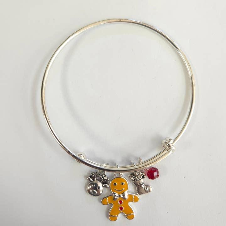 B0267 QB7936 Pulseira de Natal por atacado de Greater Goods Imports & Wholesale