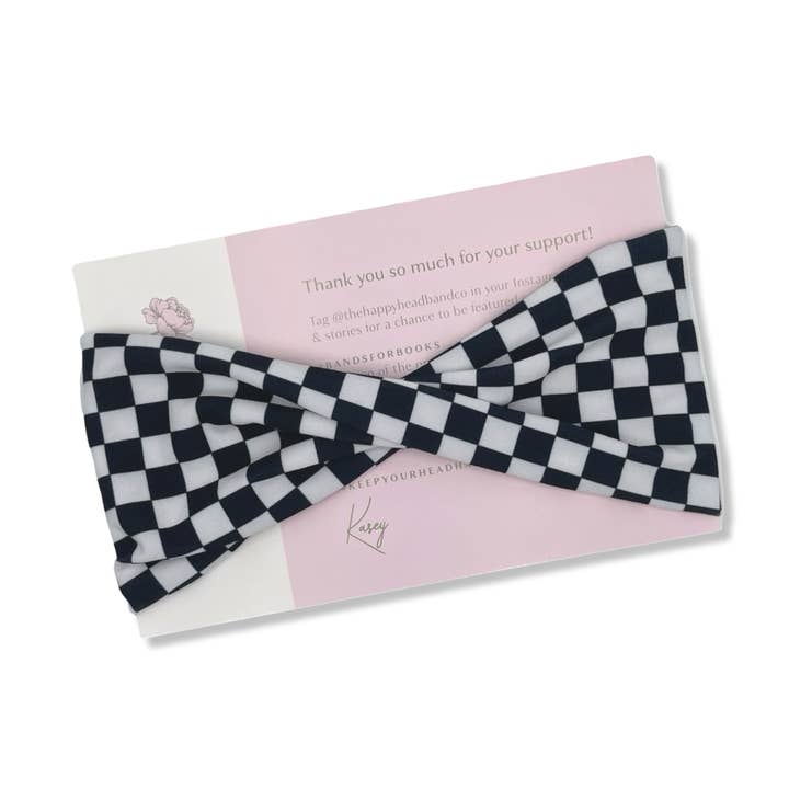 Zwart-wit geruite hoofdband met brede draaiing voor wholesale door The Happy Headband Co