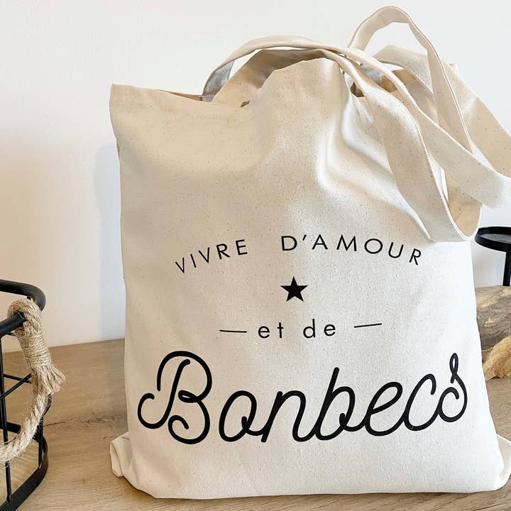 "Vivre af kærlighed og slik" råhvid knudetote taske for engroshandel hos Marcel & Lily