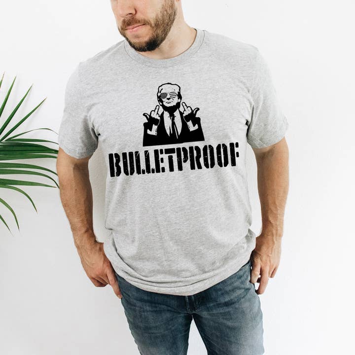 Trump à l'épreuve des balles pour la vente par MidWest Tees