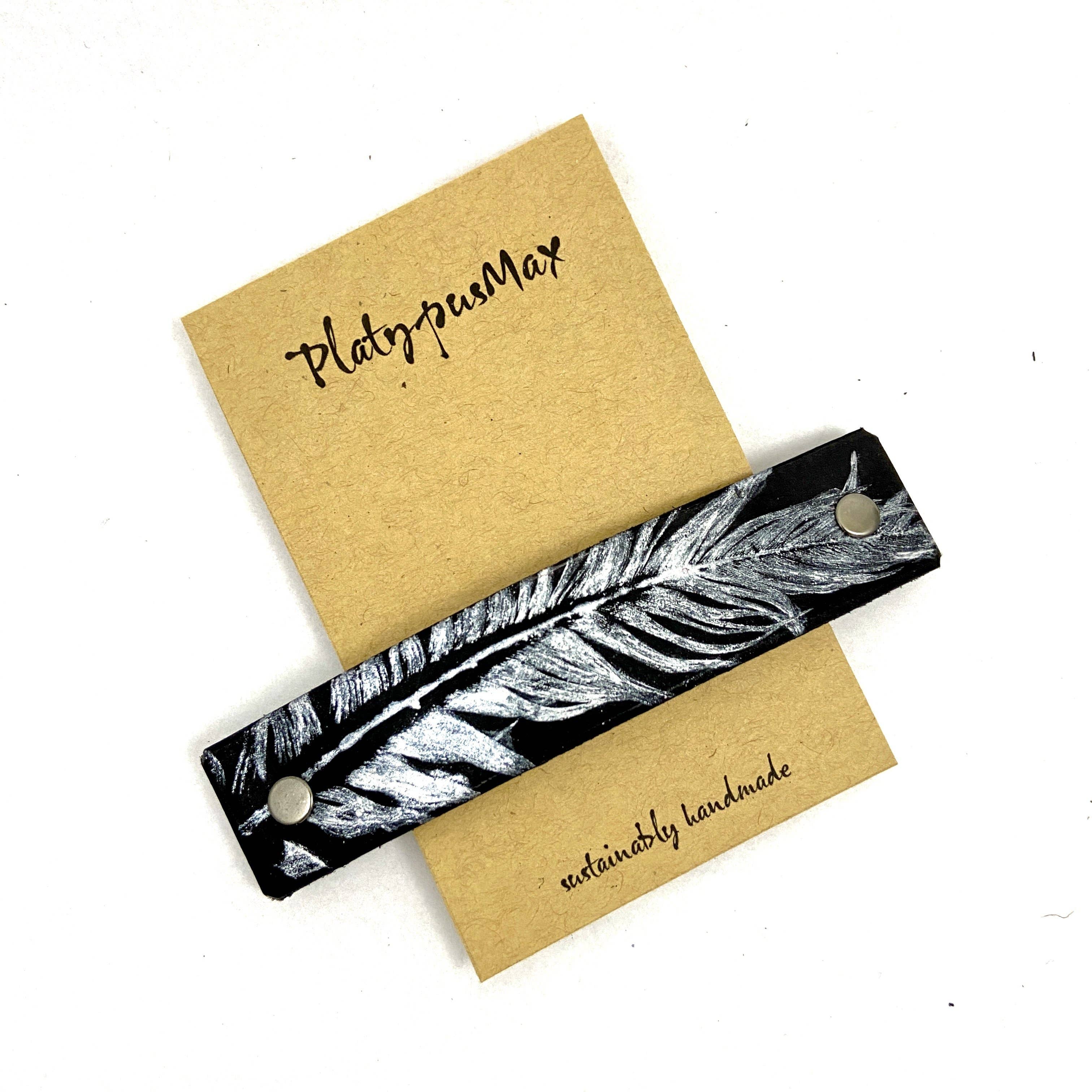 PlatypusMax - Wholesale Barrette - Women's - Silver Feather on Black Leather Hair Barrette1