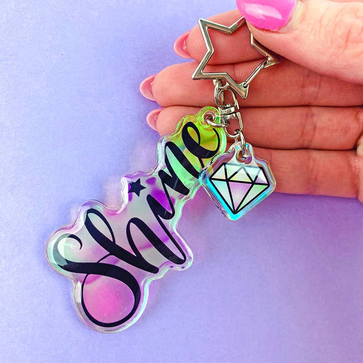 Glänsande iriserande akrylnyckelring för wholesale av Shine Sticker Studio
