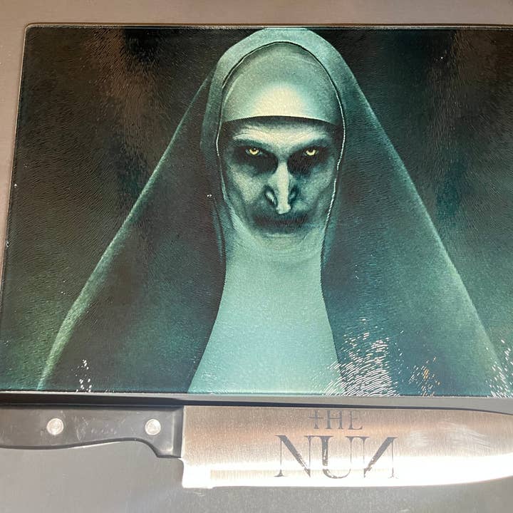 The Nun 2018 Sublimated Glass Cutting Board With Matching Knife for wholesale by Dead Dave Designs
