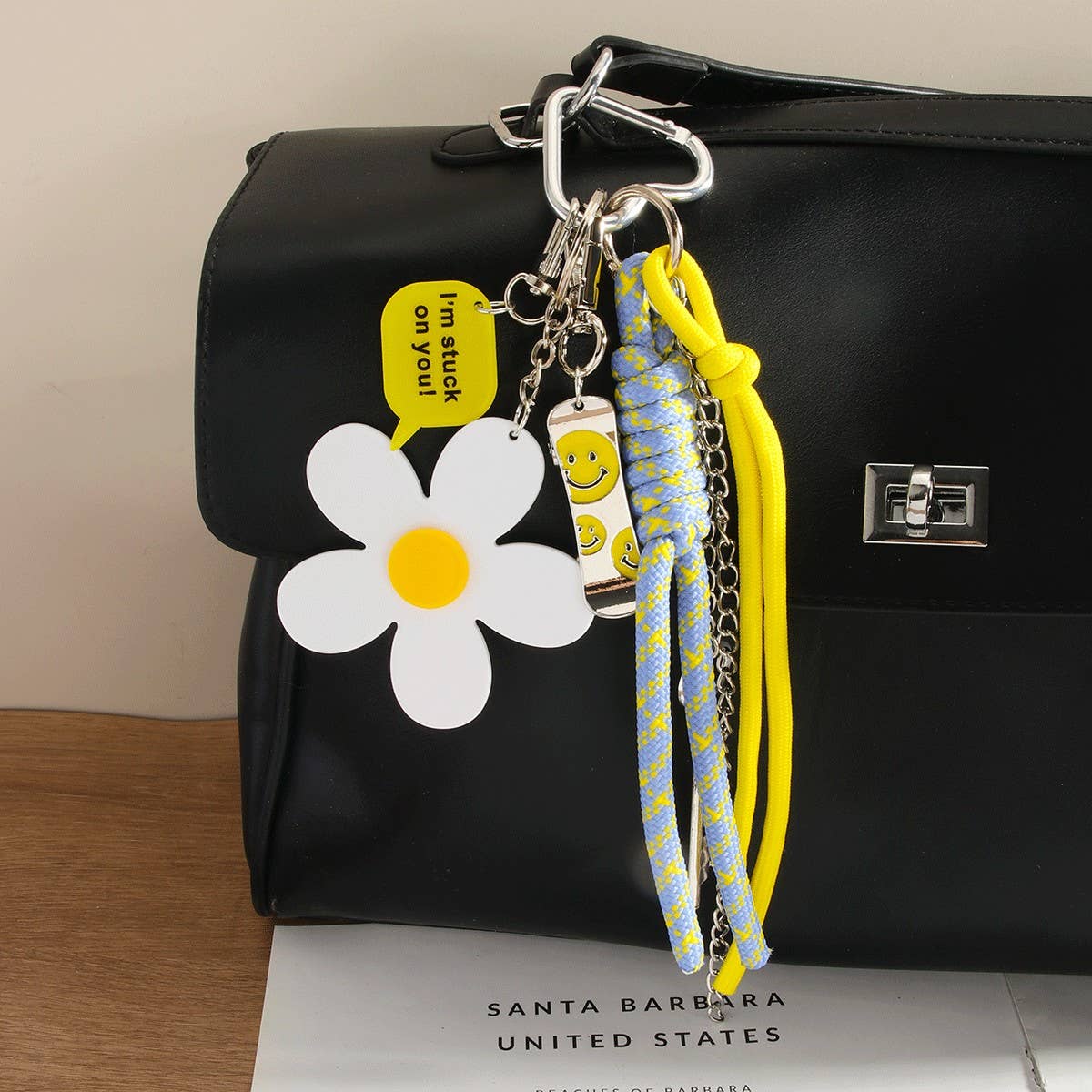 White Mini Skateboard Keychain with Daisy & Letter Charm_CWMM7551 for wholesale on Faire0