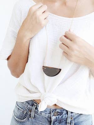 Demi Circle Necklace Horn for wholesale by Haiti Design Co.