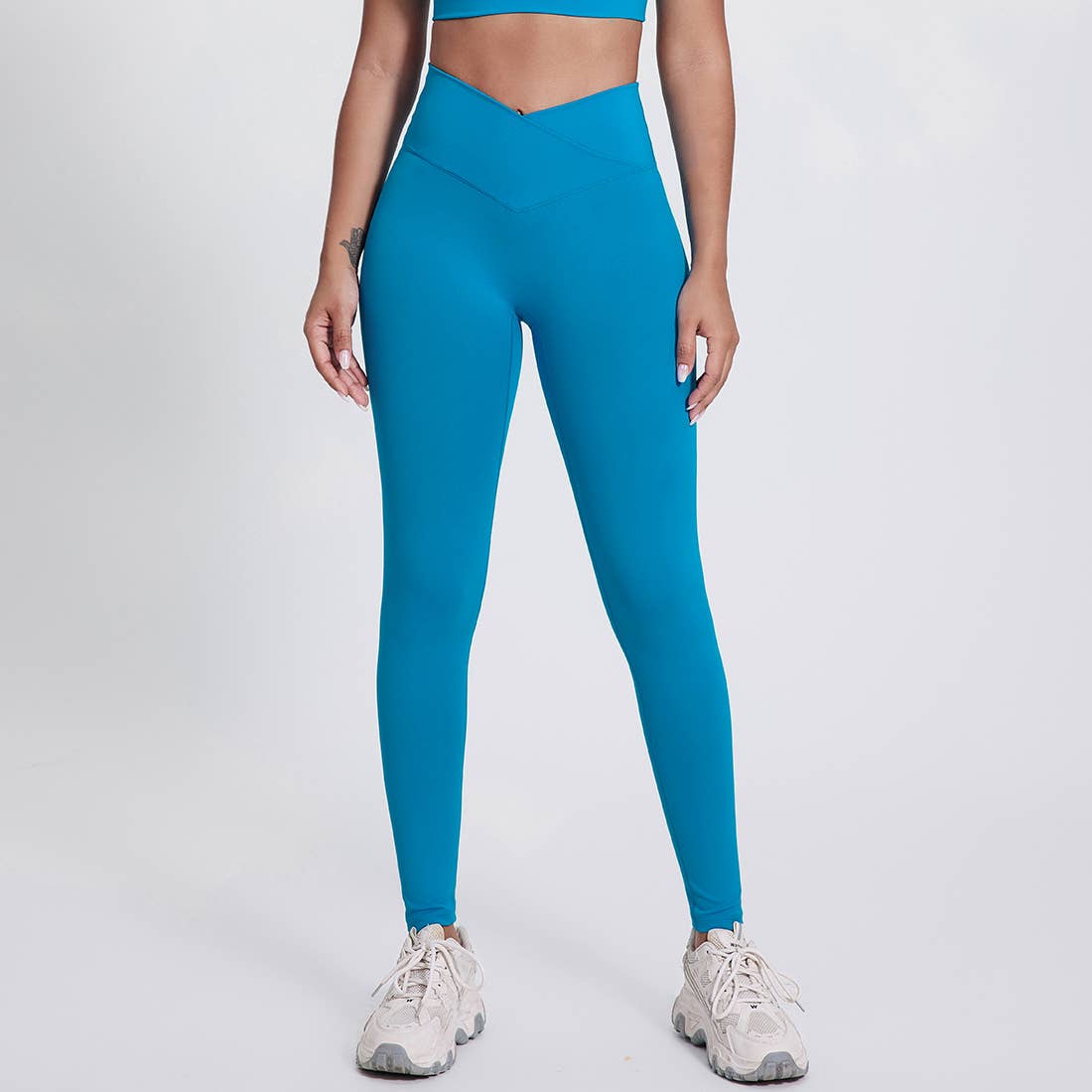 Sodalemon – Engroshandel Sports-/loungeleggings – til kvinder – Sodalemon dameleggings med krydset høj talje i ensfarvet design2