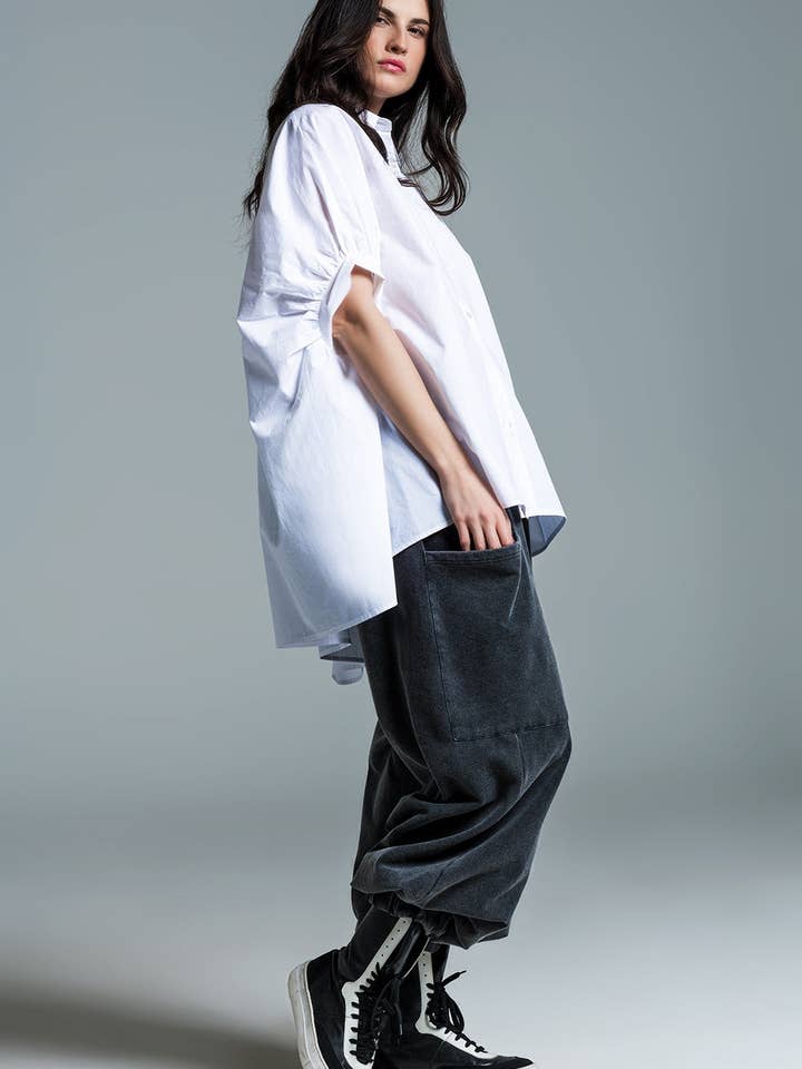 Bianco Blusa oversize bianca a maniche corte in vendita all'ingrosso su Faire2