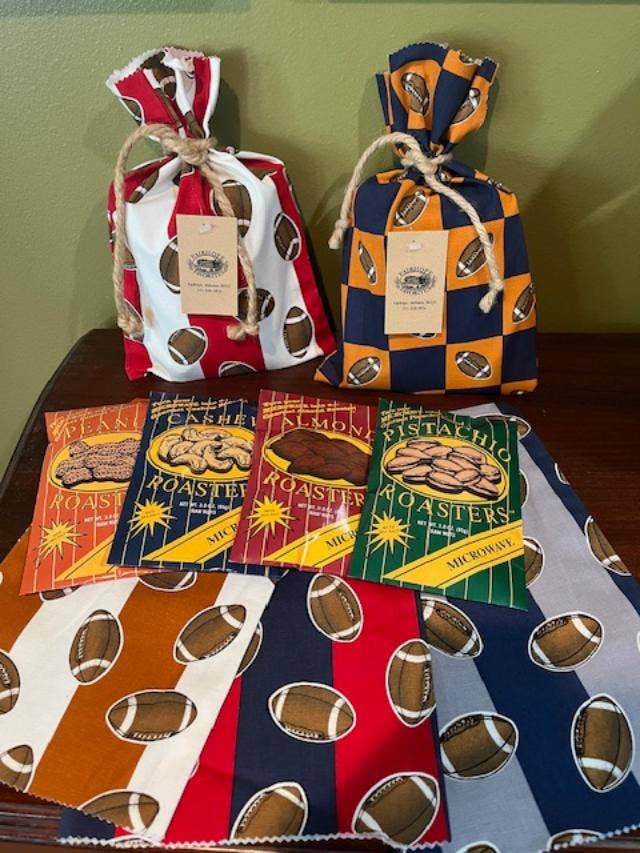 Football Gift Bags with 4 Bags of Nuts for wholesale by Fairhope Favorites, Inc.