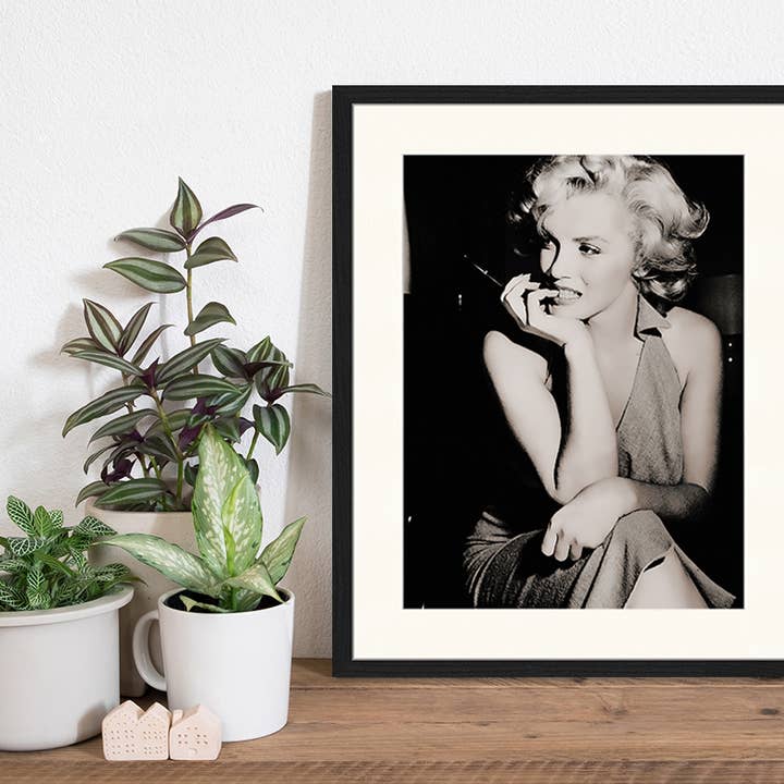 Black Marilyn Monroe image. Wall art print with frame. for wholesale on Faire