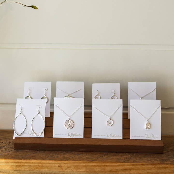 display - raised with slats for wholesale by Wild Abandon Jewelry