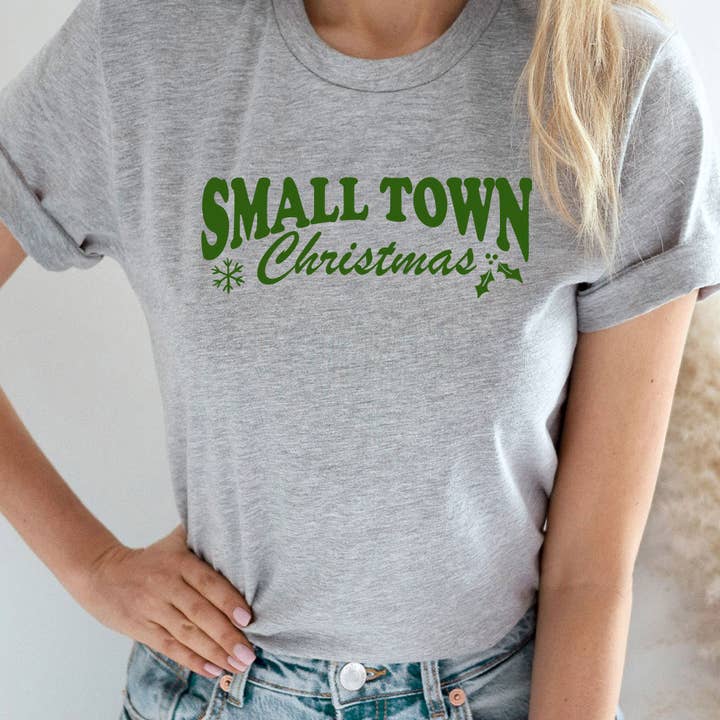 Maglietta con grafica natalizia piccola città per la vendita all'ingrosso da parte di Select Apparel