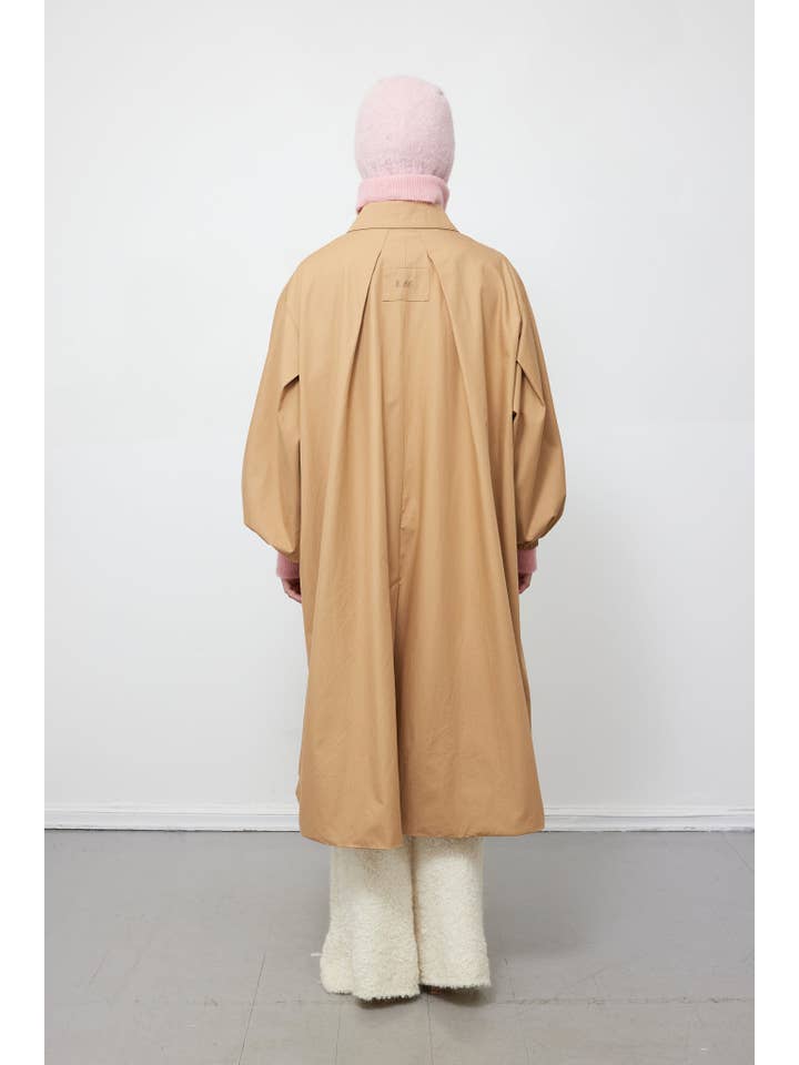 Sand Flekkpetrell mac coat for wholesale on Faire5