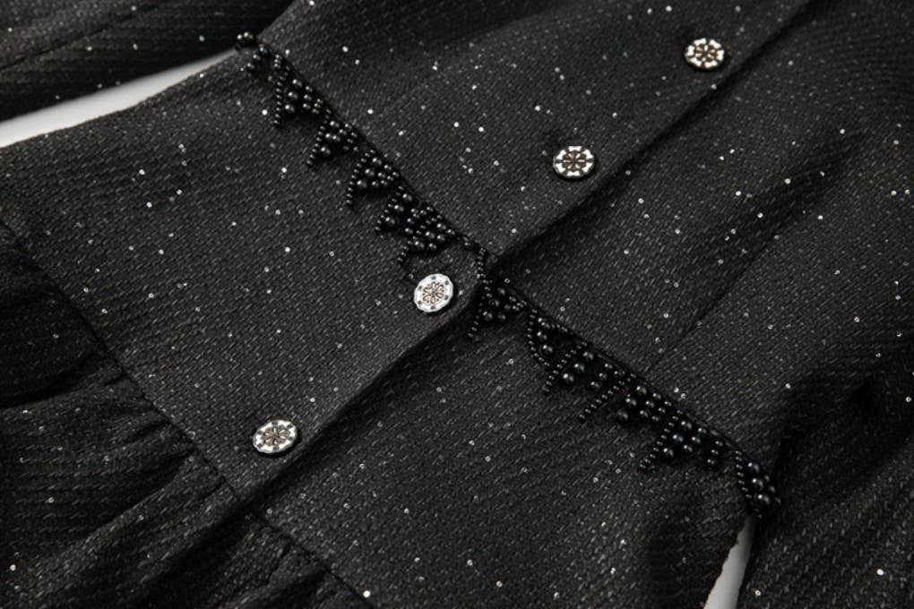 Negro CT110L Rompevientos de Pastel con Volantes y Borlas Hechas a Mano de venta al por mayor en Faire4