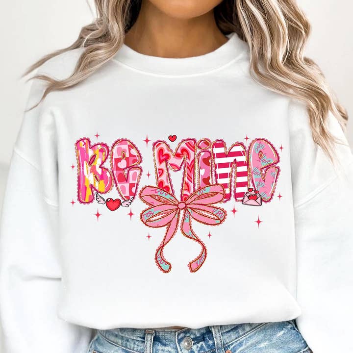 Maglietta Cuore Civettuola San Valentino Rosa, Felpa Fiocco Sii Mio per la vendita all'ingrosso da parte di DLT Ecommerce